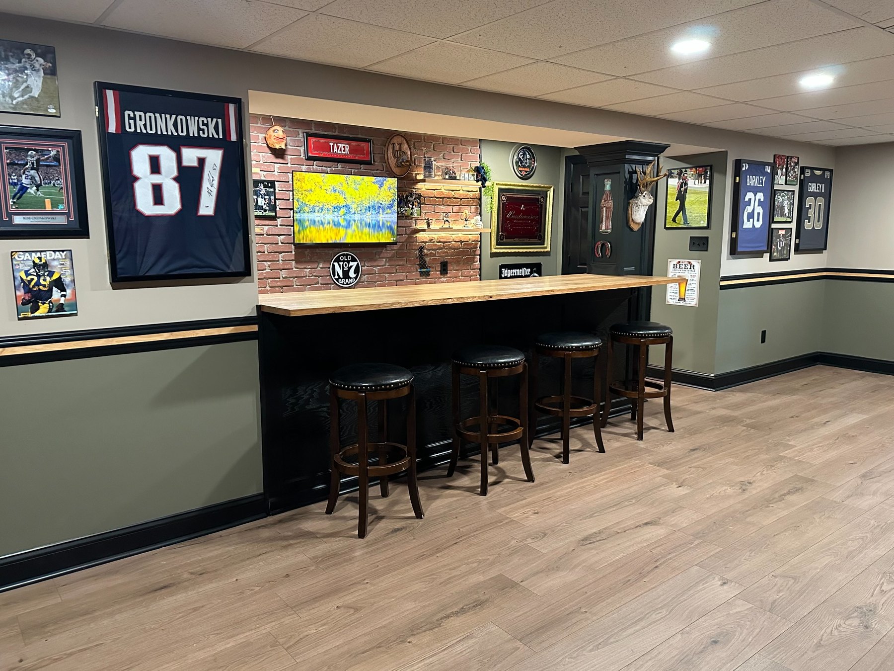 Finished custom sports basement bar